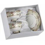 Komplet dwóch porcelanowych filiżanek ze spodkami - subtelny kwiatowy wzór